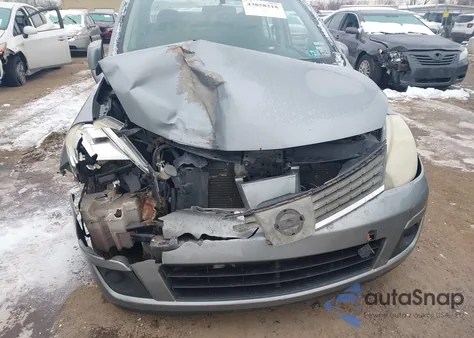 2009 Nissan Versa 1.8Sl z USA, uszkodzony, nr VIN 3N1BC11EX9L446529